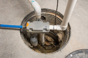 A sump pump used in basement waterproofing for Peoria IL